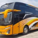 Jangan asal pilih bus wisata sekolah murah! Simak tips cerdas cek legalitas SPIONAM Kemenhub dan aturan jam kerja sopir demi keselamatan.