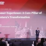 Bank Mandiri meraih Grand Champion CX100 Award 2026. Simak daftar delapan BUMN juara sektor dan strategi Danantara meningkatkan layanan.